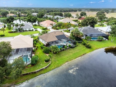 This gorgeous, updated home offers an expansive view of the lake on Gateway Golf and Country Club in Florida - for sale on GolfHomes.com, golf home, golf lot