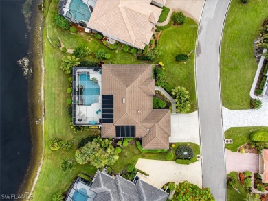 This gorgeous, updated home offers an expansive view of the lake on Gateway Golf and Country Club in Florida - for sale on GolfHomes.com, golf home, golf lot