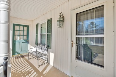 This traditional 4-bedroom, 3-bathroom home overlooks the 2nd on Cobbs Glen Country Club in South Carolina - for sale on GolfHomes.com, golf home, golf lot