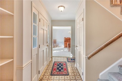 This traditional 4-bedroom, 3-bathroom home overlooks the 2nd on Cobbs Glen Country Club in South Carolina - for sale on GolfHomes.com, golf home, golf lot