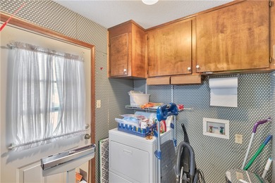 This traditional 4-bedroom, 3-bathroom home overlooks the 2nd on Cobbs Glen Country Club in South Carolina - for sale on GolfHomes.com, golf home, golf lot