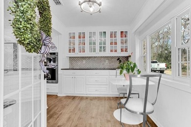 LOCATION, CHARM, AND FULL GUEST HOUSE. Nestled at the end of a on Hide-A-Way Lake Golf Course in Texas - for sale on GolfHomes.com, golf home, golf lot