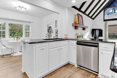 LOCATION, CHARM, AND FULL GUEST HOUSE. Nestled at the end of a on Hide-A-Way Lake Golf Course in Texas - for sale on GolfHomes.com, golf home, golf lot