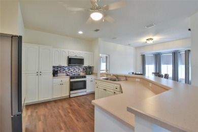 Under contract-accepting backup offers. OPEN FLOOR PLAN - MOVE on Ocala Palms Golf and Country Club in Florida - for sale on GolfHomes.com, golf home, golf lot