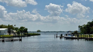 An absolute boater's dream right off the Calossahatchee River on Riverbend Golf and Country Club in Florida - for sale on GolfHomes.com, golf home, golf lot