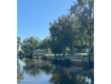 Ready for you to build your piece of paradise on this scenic lot on The Bridges Golf Club At Hollywood Casino in Mississippi - for sale on GolfHomes.com, golf home, golf lot