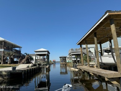 Ready for you to build your piece of paradise on this scenic lot on The Bridges Golf Club At Hollywood Casino in Mississippi - for sale on GolfHomes.com, golf home, golf lot