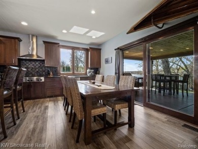 LAKE LIVING AT ITS FINEST ON PRIVATE - ALL SPORTS - LOWER on Edgewood Country Club in Michigan - for sale on GolfHomes.com, golf home, golf lot