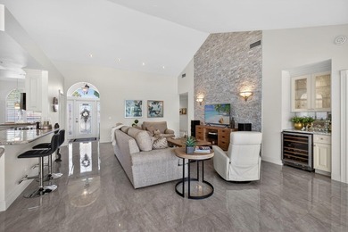 Completely renovated pool home nestled on spectacular golf on Bear Lakes Country Club in Florida - for sale on GolfHomes.com, golf home, golf lot