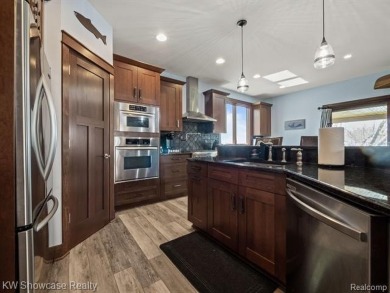 LAKE LIVING AT ITS FINEST ON PRIVATE - ALL SPORTS - LOWER on Edgewood Country Club in Michigan - for sale on GolfHomes.com, golf home, golf lot