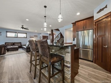 LAKE LIVING AT ITS FINEST ON PRIVATE - ALL SPORTS - LOWER on Edgewood Country Club in Michigan - for sale on GolfHomes.com, golf home, golf lot