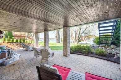 LAKE LIVING AT ITS FINEST ON PRIVATE - ALL SPORTS - LOWER on Edgewood Country Club in Michigan - for sale on GolfHomes.com, golf home, golf lot