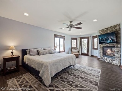 LAKE LIVING AT ITS FINEST ON PRIVATE - ALL SPORTS - LOWER on Edgewood Country Club in Michigan - for sale on GolfHomes.com, golf home, golf lot