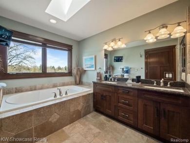 LAKE LIVING AT ITS FINEST ON PRIVATE - ALL SPORTS - LOWER on Edgewood Country Club in Michigan - for sale on GolfHomes.com, golf home, golf lot