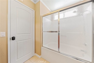 Welcome to this beautiful, single-story, home nestled in the on Menifee Lakes Country Club - Lakes in California - for sale on GolfHomes.com, golf home, golf lot