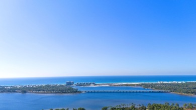 Serene wooded lot with pond in rear. Price includes ARB approved on Sharks Tooth Golf Club in Florida - for sale on GolfHomes.com, golf home, golf lot