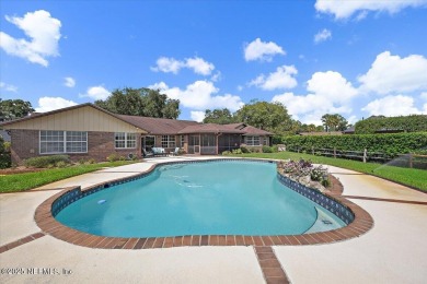 This one has room everywhere you want it! A big, open family on The Deerwood Country Club in Florida - for sale on GolfHomes.com, golf home, golf lot