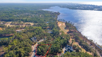 This is a large (.6 acre) homesite with potential water views is on Sharks Tooth Golf Club in Florida - for sale on GolfHomes.com, golf home, golf lot