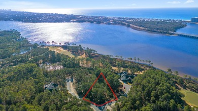 This is a large (.6 acre) homesite with potential water views is on Sharks Tooth Golf Club in Florida - for sale on GolfHomes.com, golf home, golf lot