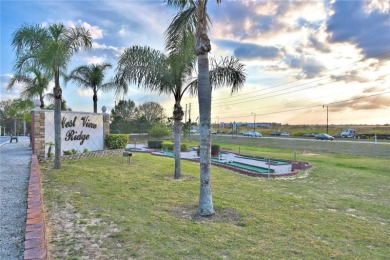 BEAUTIFULLY WELL-MAINTAINED FLORIDA GETAWAY in the desired GATED on Southern Dunes Golf and Country Club in Florida - for sale on GolfHomes.com, golf home, golf lot