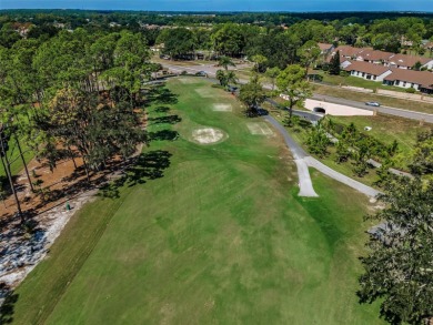 IN TIMBER GREENS ON THE GOLF COURSE OVERLOOKING THE 11TH FAIRWAY on Timber Greens Country Club in Florida - for sale on GolfHomes.com, golf home, golf lot