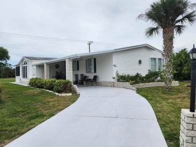 Welcome to this lovely 3BR/2BA located in the 55+ active adult on Spanish Lakes Fairways in Florida - for sale on GolfHomes.com, golf home, golf lot