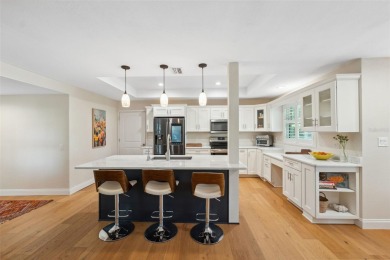 This charming and private 3-bedroom, 2-bathroom home is the on The Dunedin Country Club in Florida - for sale on GolfHomes.com, golf home, golf lot