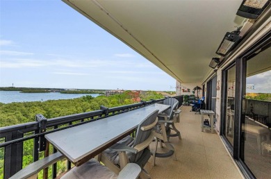 WATERFRONT LIFE AT ITS BEST! Spectacular sunsets, relaxing on The Dunedin Country Club in Florida - for sale on GolfHomes.com, golf home, golf lot