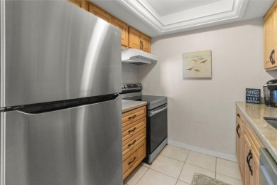 Welcome home to this 2 bedroom / 2 bathroom END UNIT on the ICW on Ocean Palm Golf Course in Florida - for sale on GolfHomes.com, golf home, golf lot
