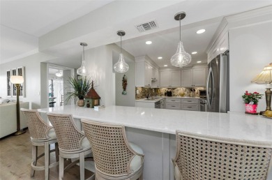 WATERFRONT LIFE AT ITS BEST! Spectacular sunsets, relaxing on The Dunedin Country Club in Florida - for sale on GolfHomes.com, golf home, golf lot