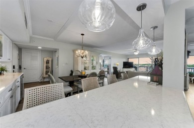 WATERFRONT LIFE AT ITS BEST! Spectacular sunsets, relaxing on The Dunedin Country Club in Florida - for sale on GolfHomes.com, golf home, golf lot