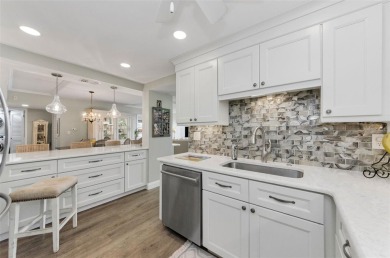 WATERFRONT LIFE AT ITS BEST! Spectacular sunsets, relaxing on The Dunedin Country Club in Florida - for sale on GolfHomes.com, golf home, golf lot