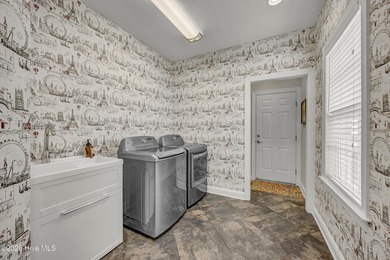 Charming, updated home in Landfall/ Bay Colony. This lovely home on Country Club of Landfall in North Carolina - for sale on GolfHomes.com, golf home, golf lot