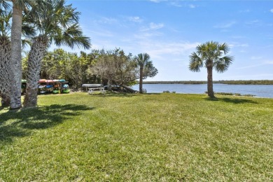 Welcome home to this 2 bedroom / 2 bathroom END UNIT on the ICW on Ocean Palm Golf Course in Florida - for sale on GolfHomes.com, golf home, golf lot
