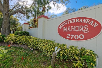 WATERFRONT LIFE AT ITS BEST! Spectacular sunsets, relaxing on The Dunedin Country Club in Florida - for sale on GolfHomes.com, golf home, golf lot