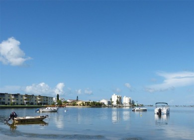WATERFRONT LIFE AT ITS BEST! Spectacular sunsets, relaxing on The Dunedin Country Club in Florida - for sale on GolfHomes.com, golf home, golf lot