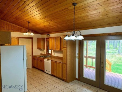 Immaculate custom home with room to roam. 3 BR, 2 BA 2,656 total on Double Arrow Lodge in Montana - for sale on GolfHomes.com, golf home, golf lot