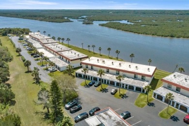 Welcome home to this 2 bedroom / 2 bathroom END UNIT on the ICW on Ocean Palm Golf Course in Florida - for sale on GolfHomes.com, golf home, golf lot