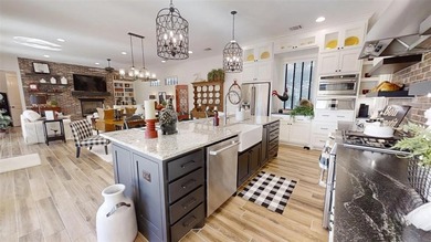 Immaculate garden home in The Vineyards offering low-maintenance on Harbor Lakes Golf Club in Texas - for sale on GolfHomes.com, golf home, golf lot