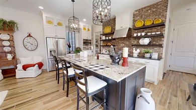 Immaculate garden home in The Vineyards offering low-maintenance on Harbor Lakes Golf Club in Texas - for sale on GolfHomes.com, golf home, golf lot