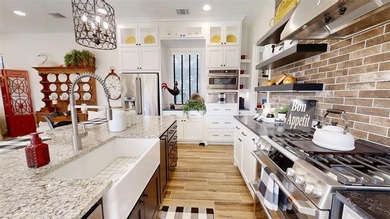 Immaculate garden home in The Vineyards offering low-maintenance on Harbor Lakes Golf Club in Texas - for sale on GolfHomes.com, golf home, golf lot