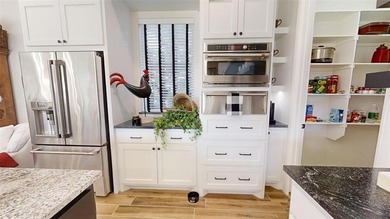 Immaculate garden home in The Vineyards offering low-maintenance on Harbor Lakes Golf Club in Texas - for sale on GolfHomes.com, golf home, golf lot