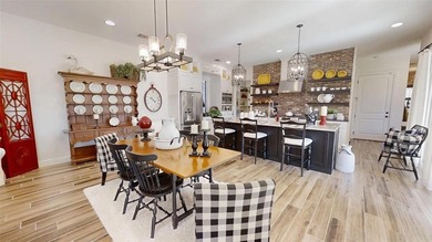 Immaculate garden home in The Vineyards offering low-maintenance on Harbor Lakes Golf Club in Texas - for sale on GolfHomes.com, golf home, golf lot