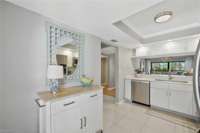 Enjoy elevated living in this beautifully updated two-bedroom on Royal Palm Golf Club in Florida - for sale on GolfHomes.com, golf home, golf lot