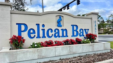 **Welcome to Your Daytona Beach Retreat: A Charming 2-Bedroom on The Club At Pelican Bay - North Course in Florida - for sale on GolfHomes.com, golf home, golf lot