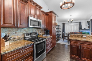 Price Slashed! Move-In-Ready Golf Course Gem at 8925 Pebble on Green Valley Country Club in Florida - for sale on GolfHomes.com, golf home, golf lot