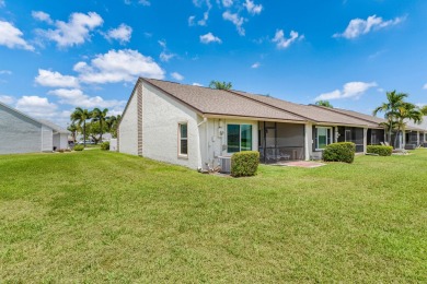 Beautifully Renovated Villa with Panoramic Lake ViewsEnjoy on Westchester Golf and Country Club in Florida - for sale on GolfHomes.com, golf home, golf lot