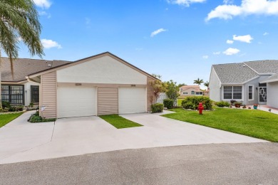Beautifully Renovated Villa with Panoramic Lake ViewsEnjoy on Westchester Golf and Country Club in Florida - for sale on GolfHomes.com, golf home, golf lot