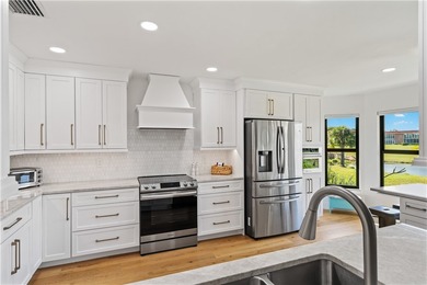 LOCATION! Rare setting on near HALF-ACRE lot. EAST OF US1! GOLF on The American Golf Club in Florida - for sale on GolfHomes.com, golf home, golf lot