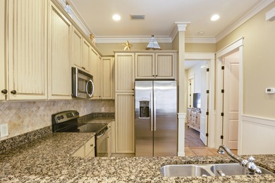 Set on a prime corner lot within the Bungalos at Sandestin, this on Sandestin Golf and Beach Resort - Raven in Florida - for sale on GolfHomes.com, golf home, golf lot